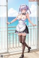 A woman in a maid outfit standing on a balcony.